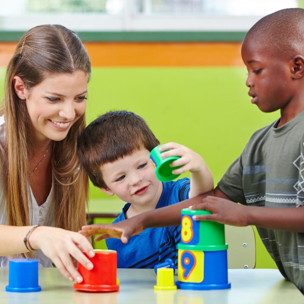 teacher with students teaching spatial concepts